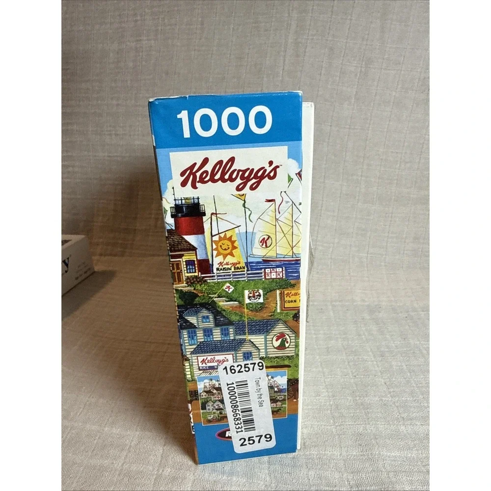 RoseArt Kellogg's Town by the Sea 1000 Piece Jigsaw Puzzle By Anthony Kleem 6130